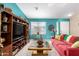 Bright living room features new paint, lots of natural light, and comfortable seating at 8554 W Keim Dr, Glendale, AZ 85305
