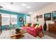 Bright living room features new paint, lots of natural light, and comfortable seating at 8554 W Keim Dr, Glendale, AZ 85305