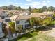 Beautiful home featuring mature trees and a cozy patio area, surrounded by lush landscaping at 8813 S 51St St # 3, Phoenix, AZ 85044