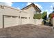 Exterior angle of a home with a two-car garage, featuring a balcony at 8813 S 51St St # 3, Phoenix, AZ 85044