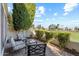 Private back patio with relaxing outdoor seating overlooking a lush green golf course at 8813 S 51St St # 3, Phoenix, AZ 85044