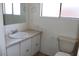 Bathroom featuring a toilet, sink, and vanity mirror at 9501 E Broadway Rd # 237, Mesa, AZ 85208