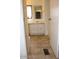 Bathroom with neutral cabinets, countertops, and flooring plus a large mirror at 9501 E Broadway Rd # 237, Mesa, AZ 85208