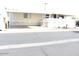 Exterior view of the home and the parking area at 9501 E Broadway Rd # 237, Mesa, AZ 85208