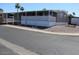 Charming single-story home with shaded carport and minimal landscaping at 9501 E Broadway Rd # 237, Mesa, AZ 85208
