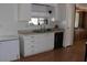 Bright kitchen featuring white cabinetry and appliances at 9501 E Broadway Rd # 237, Mesa, AZ 85208