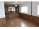 Bright living room featuring wood-look flooring and ample natural light at 9501 E Broadway Rd # 237, Mesa, AZ 85208