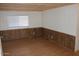 Spacious living area featuring natural light and wood-look flooring at 9501 E Broadway Rd # 237, Mesa, AZ 85208