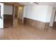 Open-concept living area with durable wood-look flooring throughout at 9501 E Broadway Rd # 237, Mesa, AZ 85208