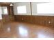 Bright living room featuring wood-look flooring and ample natural light at 9501 E Broadway Rd # 237, Mesa, AZ 85208