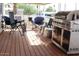 Covered patio area featuring outdoor seating and a built-in grill at 9501 E Broadway Rd # 237, Mesa, AZ 85208