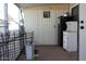 Back porch with the refrigerator and storage at 9501 E Broadway Rd # 237, Mesa, AZ 85208