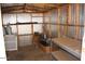 Utility shed with metal sheeting, wood frame, and storage shelves at 9501 E Broadway Rd # 237, Mesa, AZ 85208