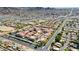 Community aerial view of apartment complex with desert landscaping and mountain backdrop at 10410 N Cave Creek Rd # 2034, Phoenix, AZ 85020