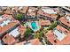 Aerial view of community swimming pool with red tile roofs at 10410 N Cave Creek Rd # 2034, Phoenix, AZ 85020