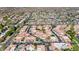 An aerial view shows an expansive residential area, highlighting the community's layout and neighborhood setting at 10410 N Cave Creek Rd # 2034, Phoenix, AZ 85020