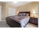 This bright main bedroom features a ceiling fan, neutral walls, and a spacious layout at 10410 N Cave Creek Rd # 2034, Phoenix, AZ 85020