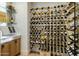 Custom wine room with elegant storage and display, perfect for the wine enthusiast at 11268 E Moonlight Cyn, Scottsdale, AZ 85255