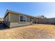 Backyard with a covered patio and view of the block wall at 11744 S 173Rd Ln, Goodyear, AZ 85338