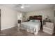 Spacious main bedroom with elegant decor and ensuite bathroom access at 1202 E Winged Foot Rd, Phoenix, AZ 85022