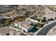 Aerial shot of a home featuring a basketball court, pool, and lush landscaping at 122 E Desert Wind Dr, Phoenix, AZ 85048