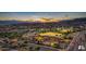 Scenic aerial of commercial center, park and mountain landscape at 122 E Desert Wind Dr, Phoenix, AZ 85048