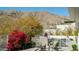 Outdoor kitchen, seating area, and landscaping at 122 E Desert Wind Dr, Phoenix, AZ 85048