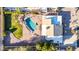 Overhead view of a backyard oasis with lush landscaping and a private pool at 12222 S Appaloosa Dr, Phoenix, AZ 85044