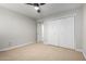 Bedroom with a closet and ceiling fan at 12222 S Appaloosa Dr, Phoenix, AZ 85044