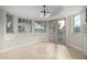 Bright breakfast nook featuring pendant lighting and walls of windows providing ample natural light at 12222 S Appaloosa Dr, Phoenix, AZ 85044