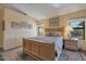 Bedroom showcasing a comfortable bed, lamps, and large windows for natural light at 12323 W Fieldstone Dr, Sun City West, AZ 85375