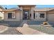 Inviting front entrance featuring a walkway with desert landscaping at 12323 W Fieldstone Dr, Sun City West, AZ 85375