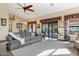 Inviting living area with ample seating, natural light and access to the backyard at 12323 W Fieldstone Dr, Sun City West, AZ 85375