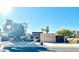 Inviting single-story home featuring a well-maintained desert landscape and a spacious two-car garage at 13234 N 2Nd St, Phoenix, AZ 85022