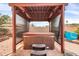 Relax in style with this covered hot tub, perfect for unwinding after a long day at 13234 N 2Nd St, Phoenix, AZ 85022