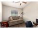 Spare room with a sofa and window at 1350 S Greenfield Rd # 1215, Mesa, AZ 85206