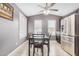 Cozy dining room features wood-look floors and ample natural light from the windows at 1565 E 10Th St, Casa Grande, AZ 85122