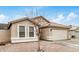 Beautiful one story home featuring desert landscaping and a two-car garage at 1565 E 10Th St, Casa Grande, AZ 85122