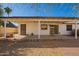 Covered back patio with ceiling fan and secure doors, perfect for entertaining at 15811 N 23Rd St, Phoenix, AZ 85022