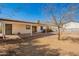 Backyard featuring a covered patio and low maintenance landscaping at 15811 N 23Rd St, Phoenix, AZ 85022