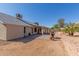 View of backyard showcasing extended covered patio and BBQ at 1715 N Sawyer --, Mesa, AZ 85207