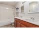 Bathroom features a dual sink vanity, tub, and shower at 1715 N Sawyer --, Mesa, AZ 85207