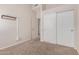 Neutral bedroom with closet, shelf and plenty of natural light at 1715 N Sawyer --, Mesa, AZ 85207