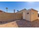 Backyard shed situated next to a block wall fence at 1715 N Sawyer --, Mesa, AZ 85207