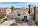 Charming single story home with desert landscaping, a two car garage, and a tile roof at 17839 W Maui Ln, Surprise, AZ 85388