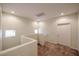 Upstairs loft with neutral colored carpet and paint, and a window for natural light at 1835 W Minton St, Phoenix, AZ 85041