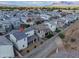 Amazing aerial view of neighborhood homes, mountains, and a covered back patio at 1901 W 23Rd Ave, Apache Junction, AZ 85120