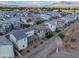 Scenic aerial view of a neighborhood with mountain views, well-kept homes, and desert-style landscaping at 1901 W 23Rd Ave, Apache Junction, AZ 85120