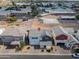 Aerial view of a two-story home with gray roof and brick driveway, located near a hospital with a helipad at 1901 W 23Rd Ave, Apache Junction, AZ 85120