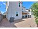 Exterior view of a home, highlighting the backyard and covered patio at 1901 W 23Rd Ave, Apache Junction, AZ 85120